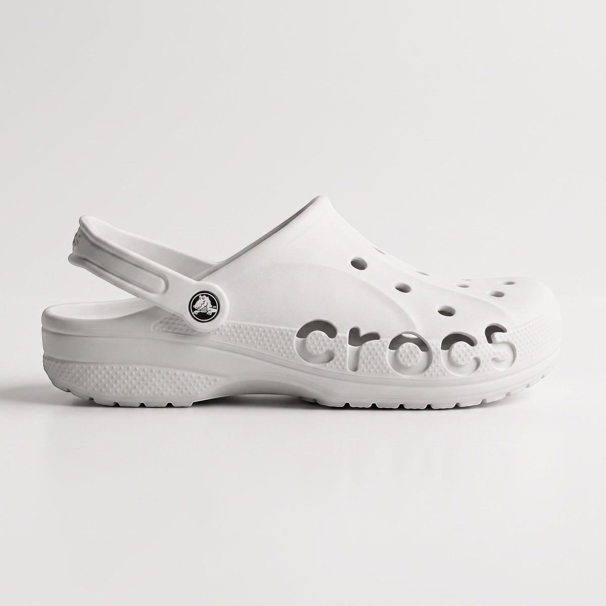 Claquettes LAS ROSAS modèle Baya blanches en mousse légère avec logo latéral et ouvertures pour charms