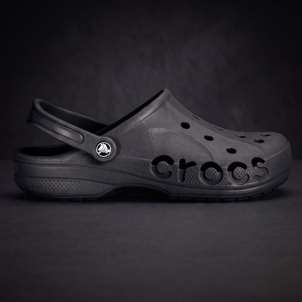 Claquettes LAS ROSAS modèle Baya noires en mousse souple avec logo découpé sur le côté et bride pivotante
